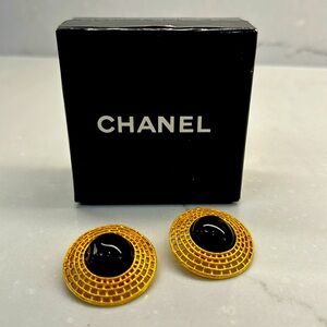 Authentic vintage Chanel clip on earrings in gold and black